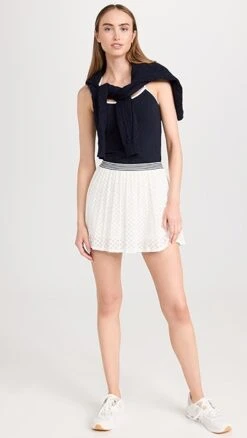 Tory Sport Pleated Laser Cut Tennis Skirt -Denim Diva Shop tspor3043514560 1682373605500 2 0. UX357 QL90